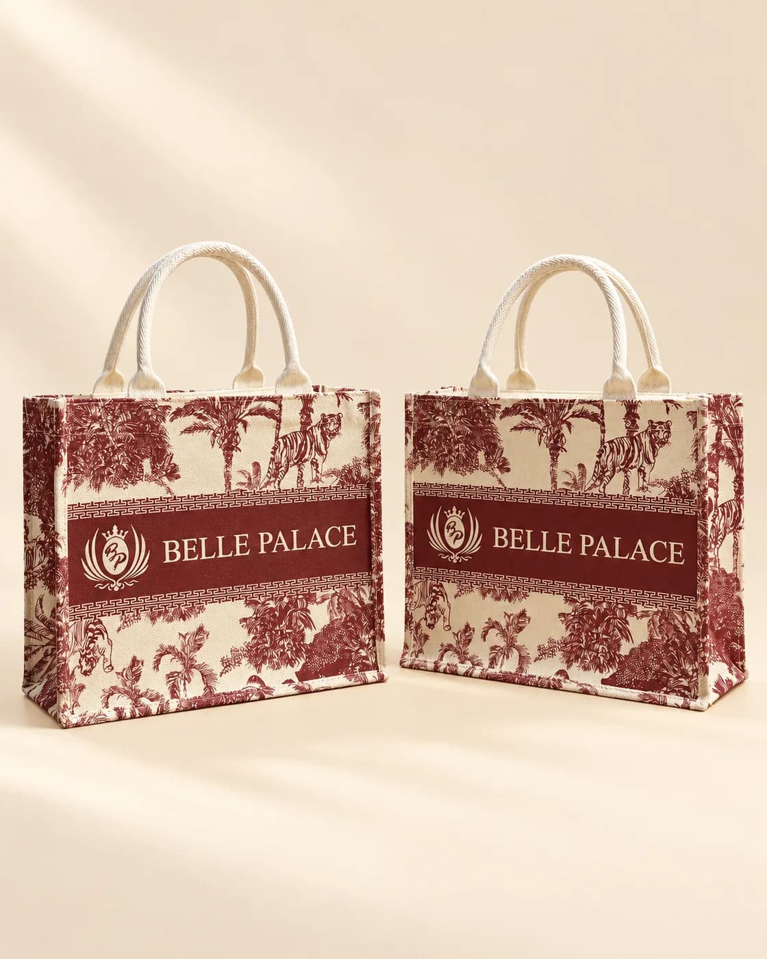 Hai túi canvas họa tiết tranh khắc màu đỏ đô, quai vải trắng, dải logo Belle Palace
